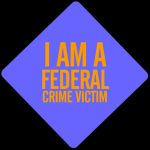 Front yard sign Im a federal cour victim
